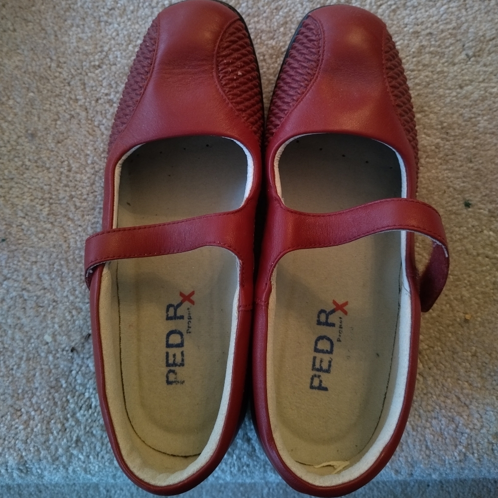 Women's Propet Erika Mary Jane flats in chili red leather.